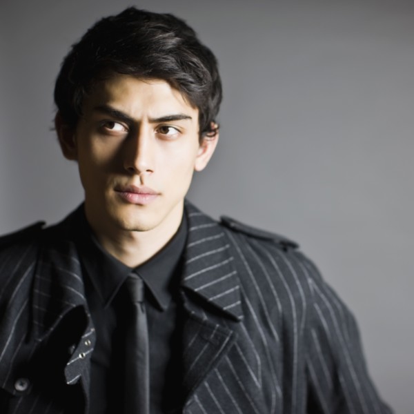 Mixed race man in fashionable coat