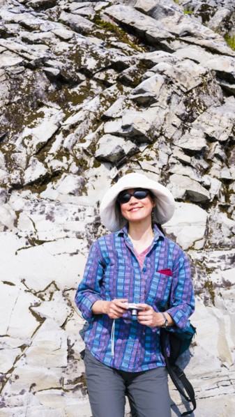 Japanese tourist photographing rock formation