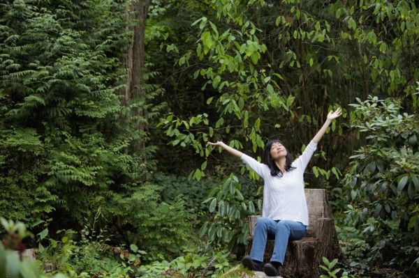 Japanese woman cheering in garden