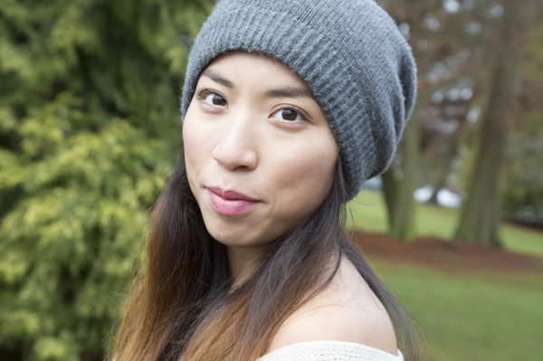 Japanese woman wearing beanie outdoors