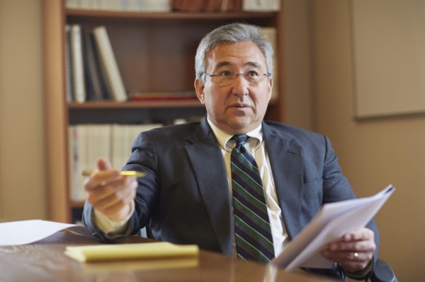 Mixed race businessman talking in office