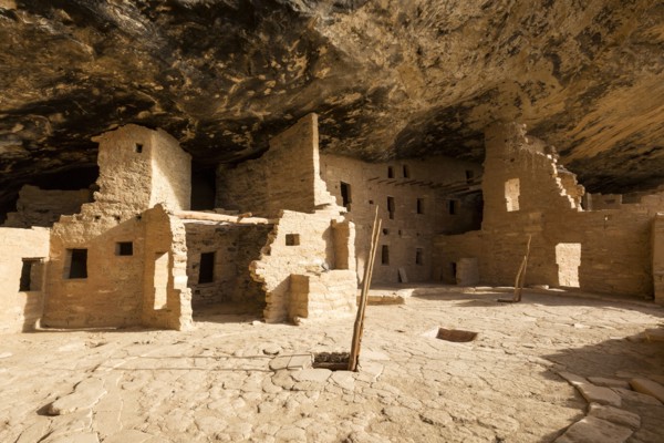 Cliff dwelling ruins in rock face