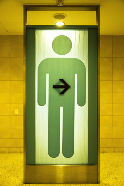 Green restroom sign for men