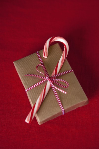 Candy can on top of Christmas gift
