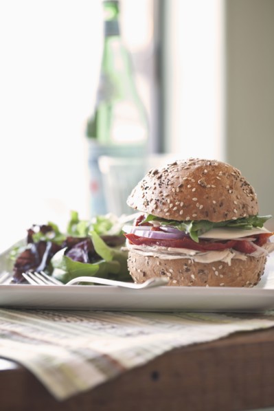Sandwich and salad on plate