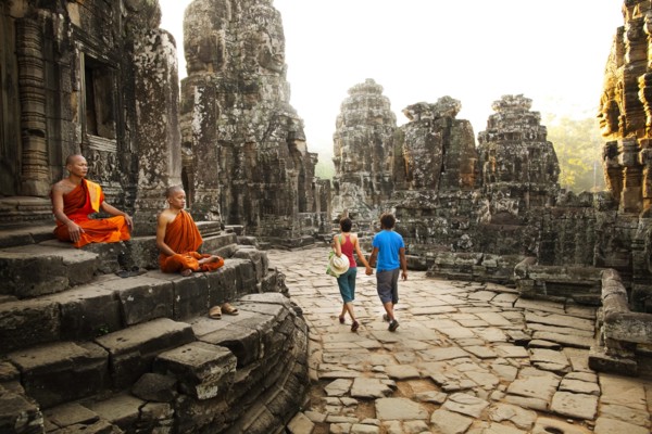 Couple visiting Buddhist temple