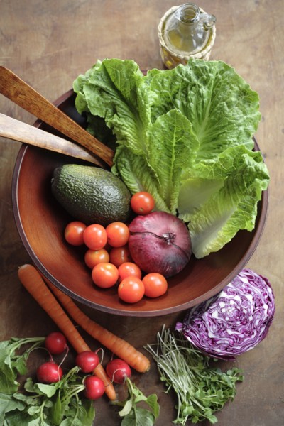 Fresh vegetables in wooden bowl