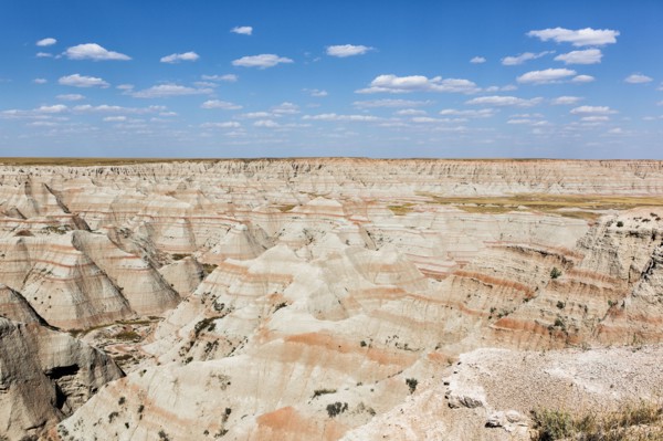 Layered rock formations under blue sky