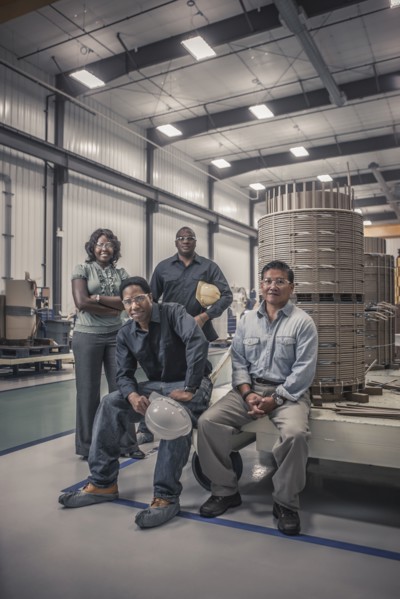 Workers together in factory