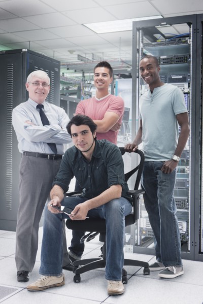 Businessmen in server room