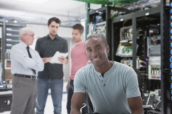 Businessmen in server room