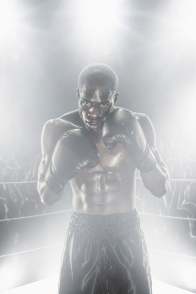 African American boxer in boxing ring