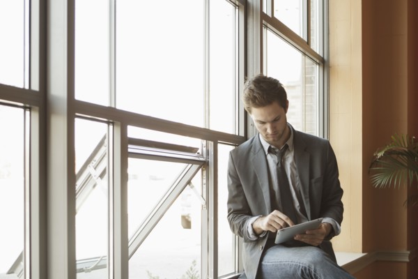 Businessman using tablet computer