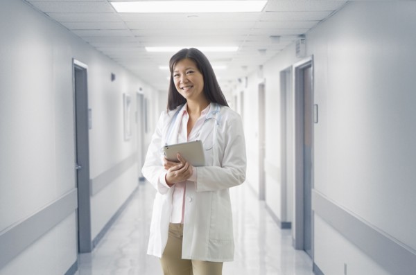 Asian doctor smiling in hospital