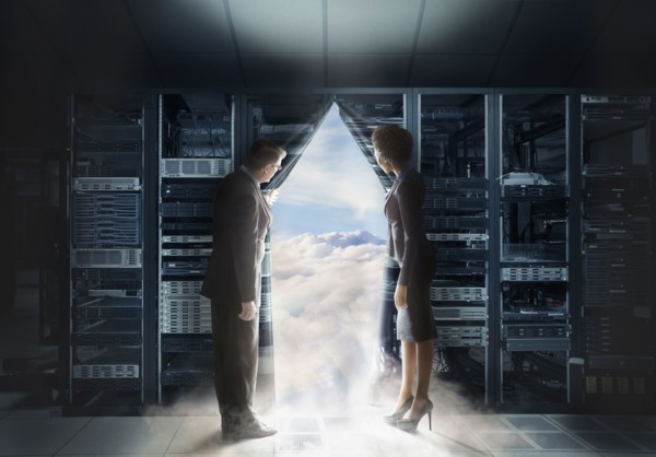 Business people pulling back curtain to clouds