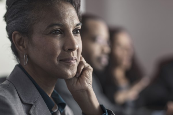 Businesswoman smiling in meeting