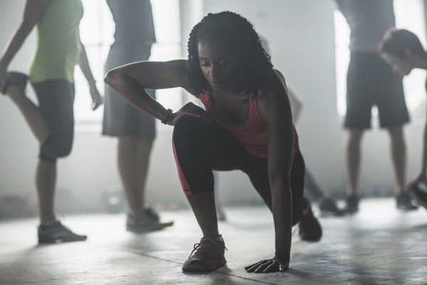 Athlete stretching in gym