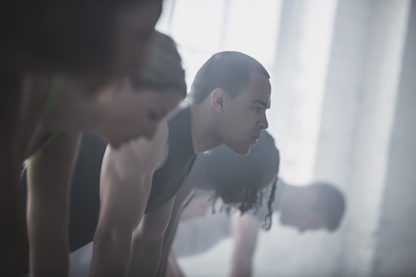 Close up of athletes looking down