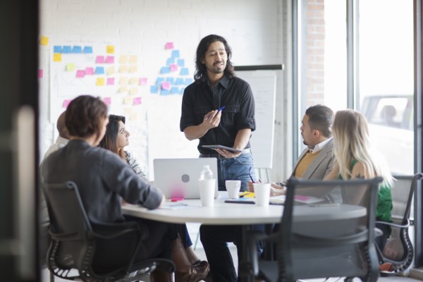 Business people talking in office meeting