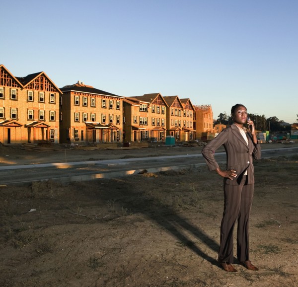 African American businesswoman at residential construction site