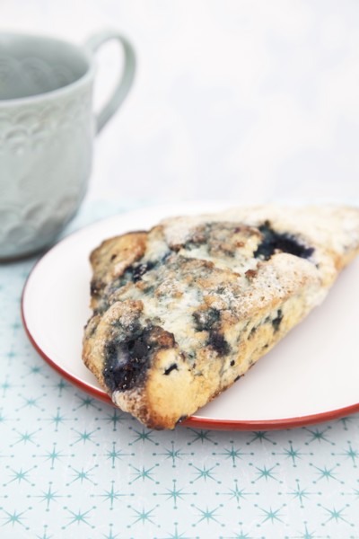 Coffee cup and scone