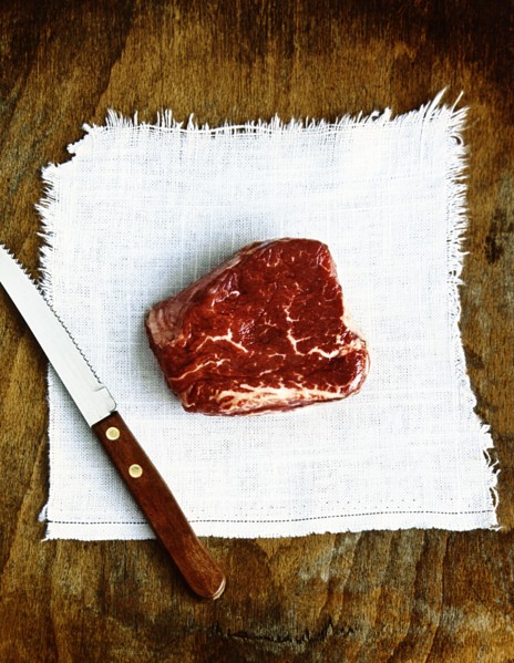 Raw beef and knife