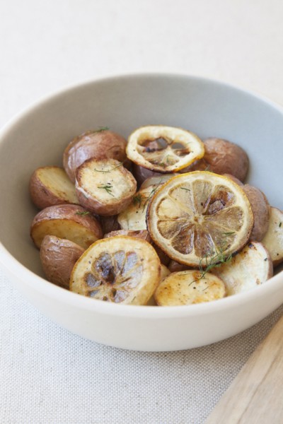Potatoes and lemon in bowl
