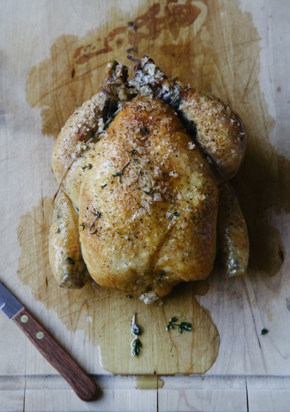 Roast chicken on cutting board