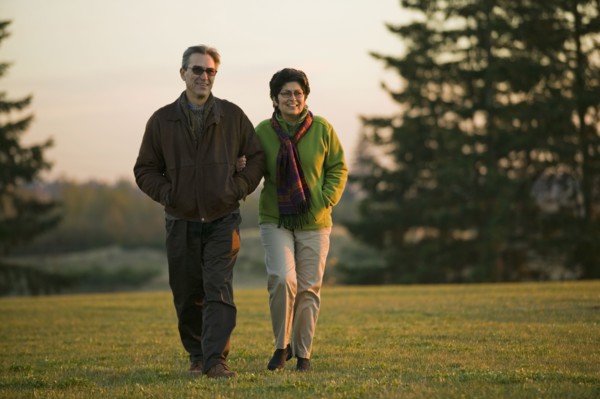 Peruvian couple walking in park