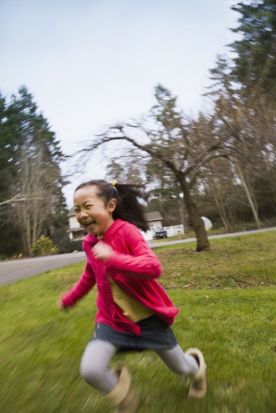 Korean girl running outdoors