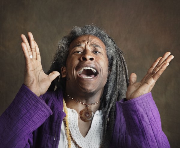 Exuberant African man with dreadlocks