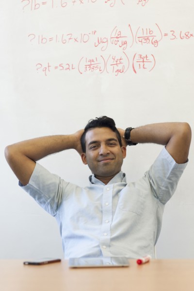 Asian businessman relaxing at desk