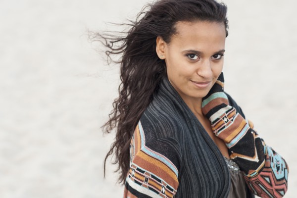 Mixed race woman wearing stylish sweater