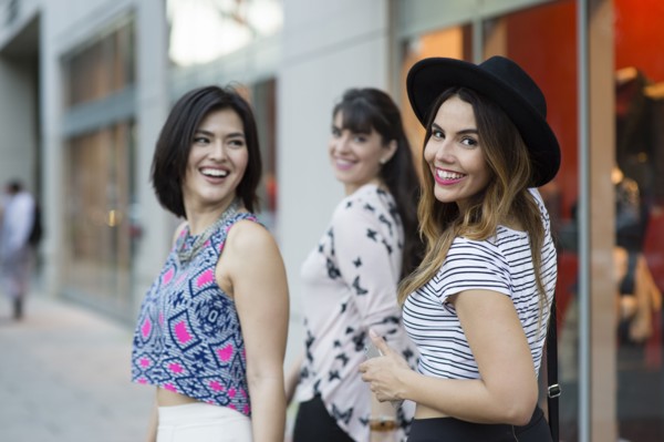 Hispanic woman smiling outdoors