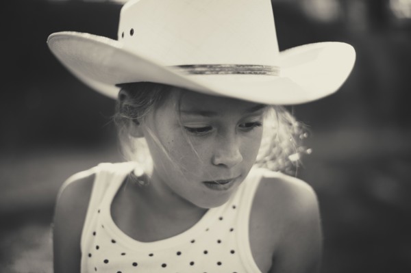 Caucasian girl in cowboy hat