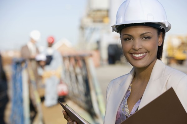 African American businesswoman wearing hardhat