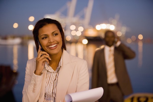 African American businesswoman talking on cell phone
