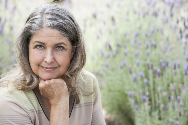 Senior Caucasian woman relaxing outdoors