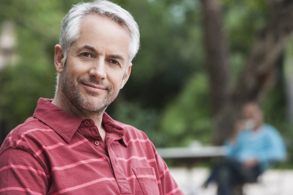 Man smiling outdoors