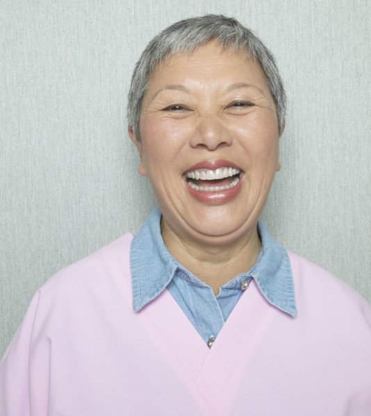 Close up of senior Asian woman laughing