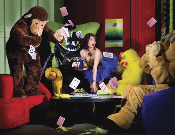 People in animal costumes playing poker