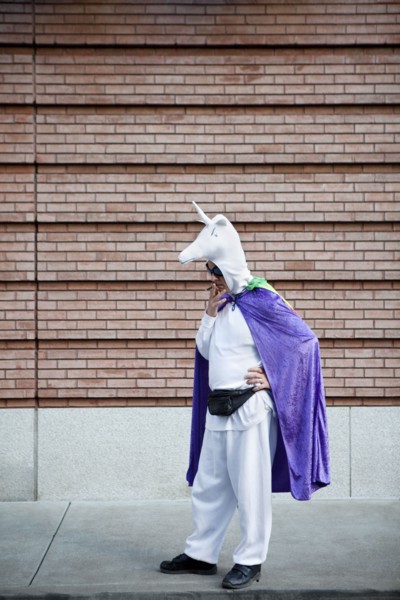 Caucasian man in unicorn costume