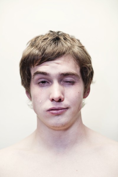 Caucasian young man crying