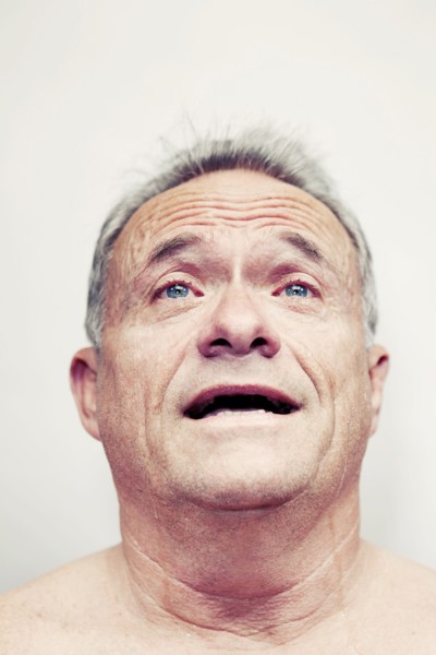 Older Caucasian man crying