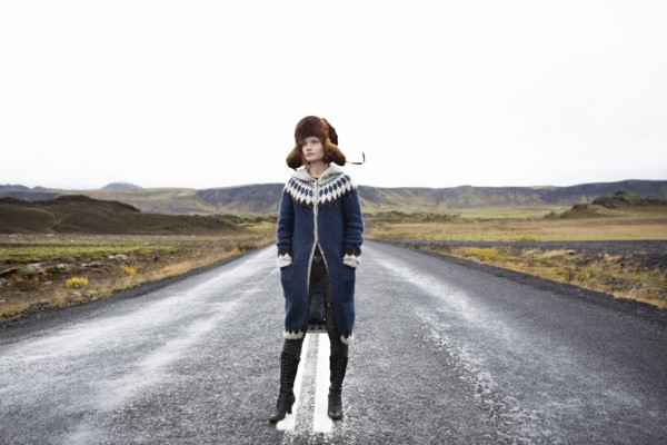 Caucasian woman standing in middle of road