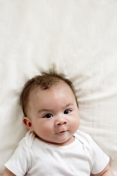 Close up of face of mixed race baby boy