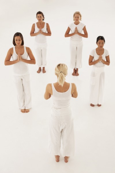 Women meditating in yoga class