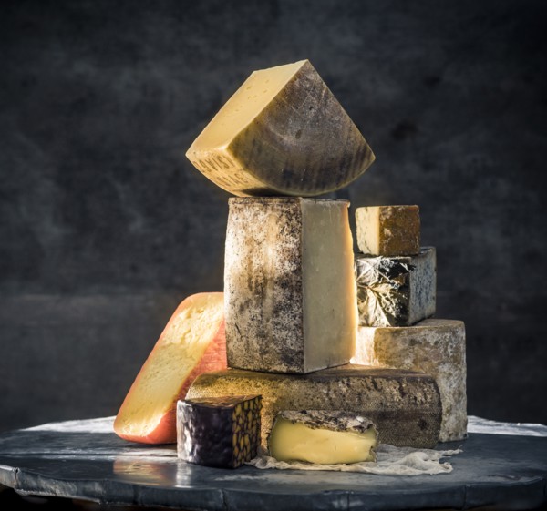 Pile of variety of cheeses