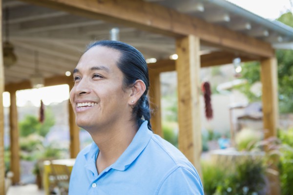 Man smiling outdoors