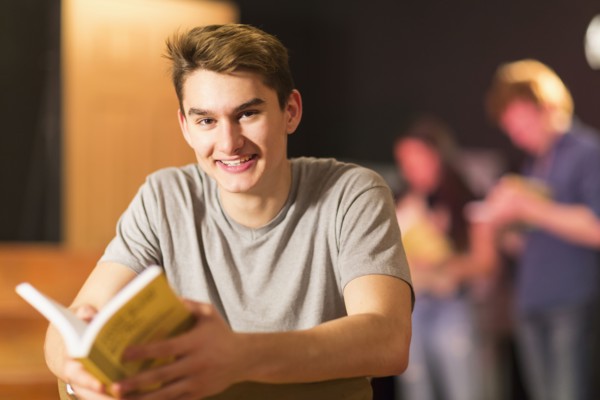Portrait of smiling Mixed Race teenage boy